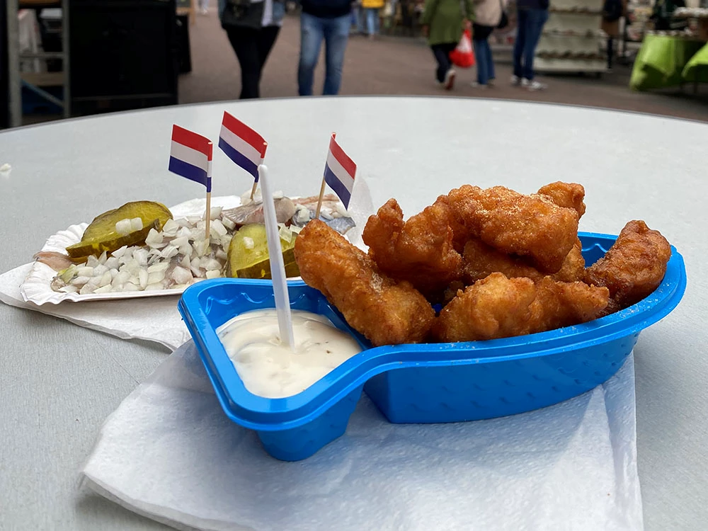 Raw herring and kibbeling at the Albert Cuyp market in Amsterdam